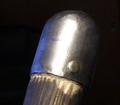 Spear shaft end cap