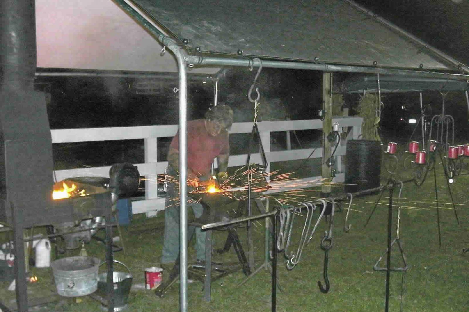 Forge welding at a demo.....night time