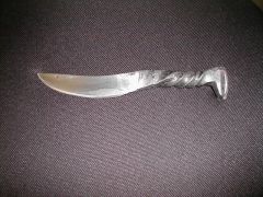 First spike knife.