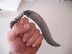 punching axe, in hand