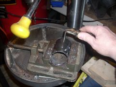 Tapping the Burner Holder