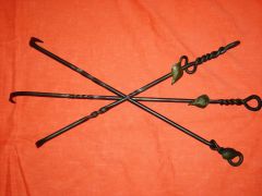 Round fire pokers.