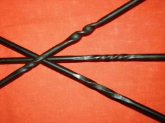 Twist on the fire pokers.