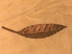 1ST. Raised vein copper leaf.