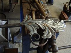 Forming a leaf and fixing to scroll 5 pinned on, wire brushed and waxed