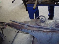 Forming a leaf and fixing to scroll 3 Scrolls formed and firewlded together