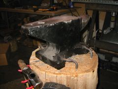 Anvil hold downs in place