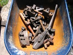 Wheel barrow  full of   Hardy tools