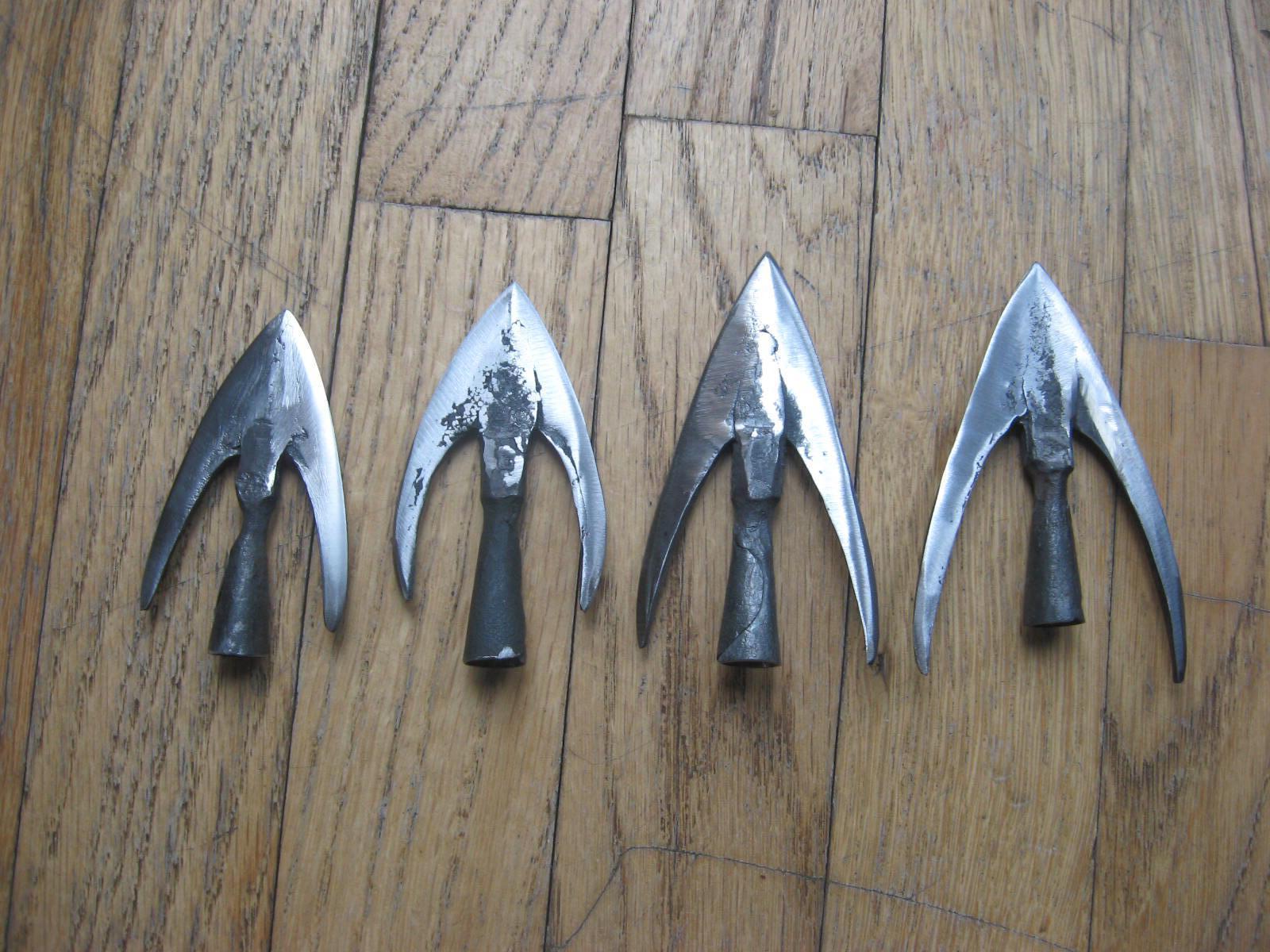 4 swallowtail arrowheads