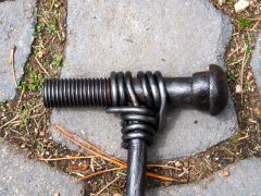 Blacksmiths cane hand detail
