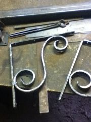 Scrolled shelf brackets