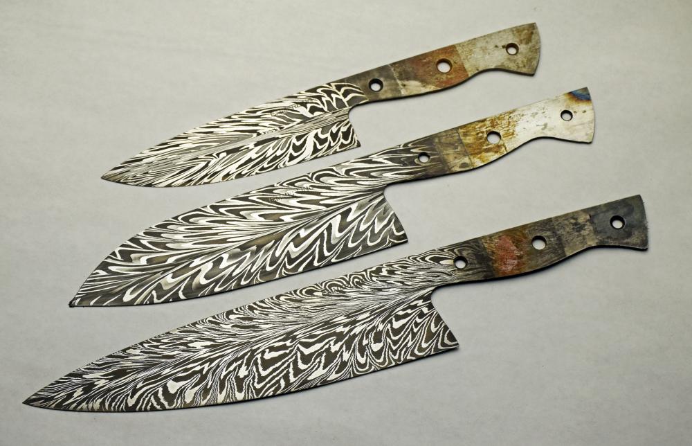 3 damascus chef blades.jpg