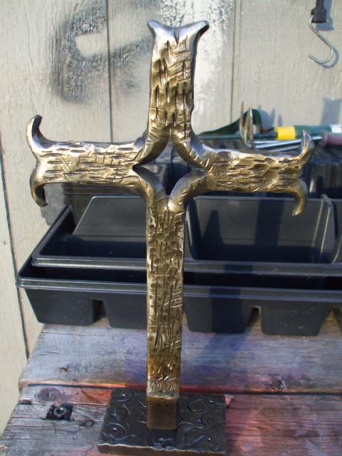 Split cross with brass highlights